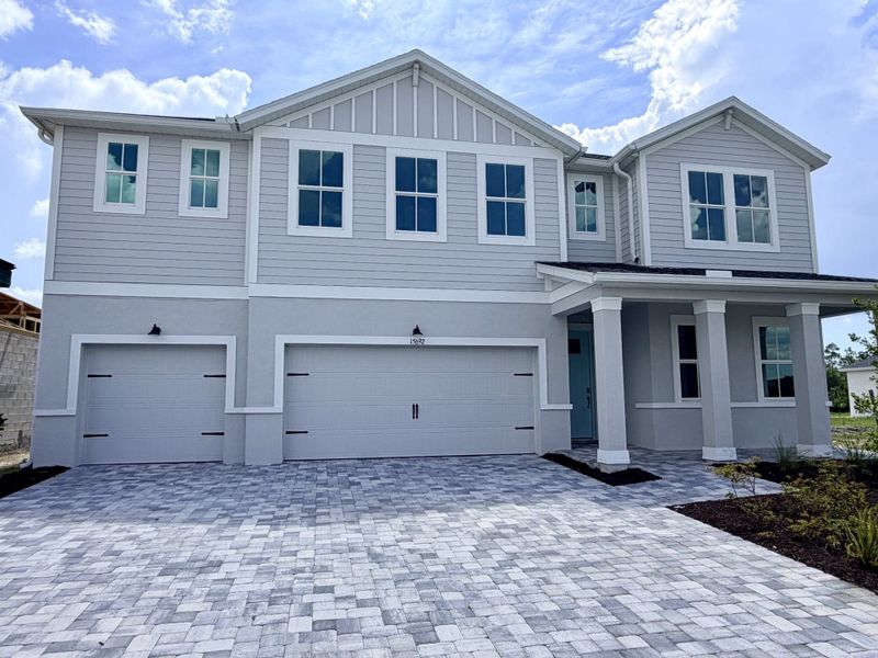 Representative exterior photo of a completed home built from the Sebastian by William Ryan Homes in Pinecone Reserve, Brooksville, FL (Image 20). Representative exterior photo of a completed home built from the Sebastian by William Ryan Homes in Pinecone Reserve, Brooksville, FL (Image 20).