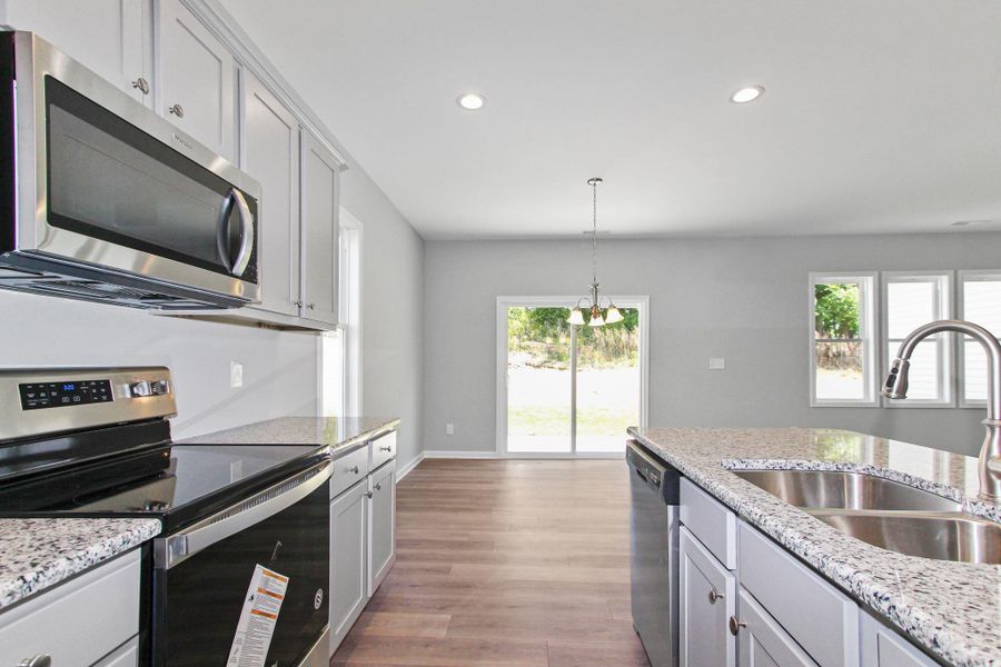 Representative furnished interior of a home built from the Nicklaus by RiverWILD Homes in Riverwood Ranch, Clayton (Image 6).
