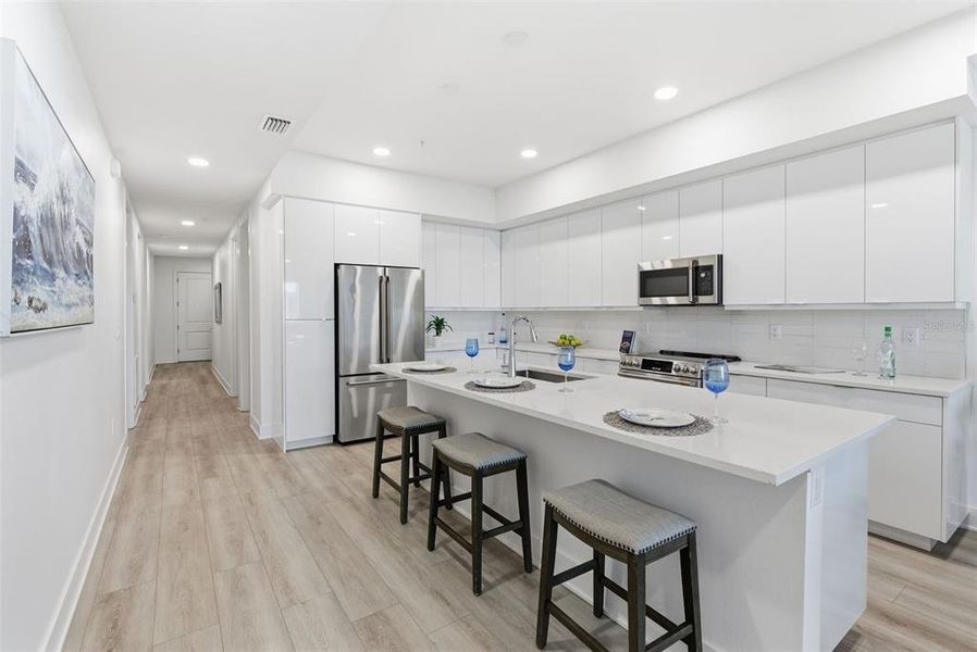 Furnished interior view inside a new home in Residences at Town Center, Madeira Beach (Image 6).