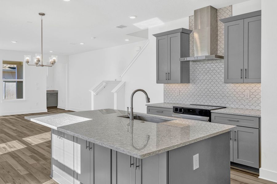 Representative furnished interior of a home built from the Whitney by Rockwell Homes in Harvest at Ovation - Townhomes, Winter Garden (Image 6). Representative furnished interior of a home built from the Whitney by Rockwell Homes in Harvest at Ovation - Townhomes, Winter Garden (Image 6).