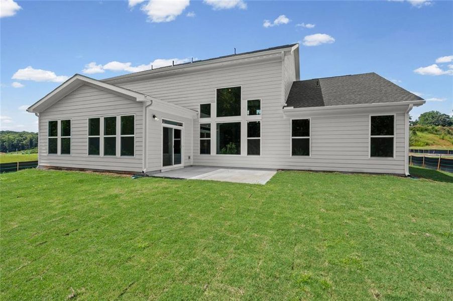 Exterior details and patio area of a home in Hidden Fields, Hoschton (Image 3).