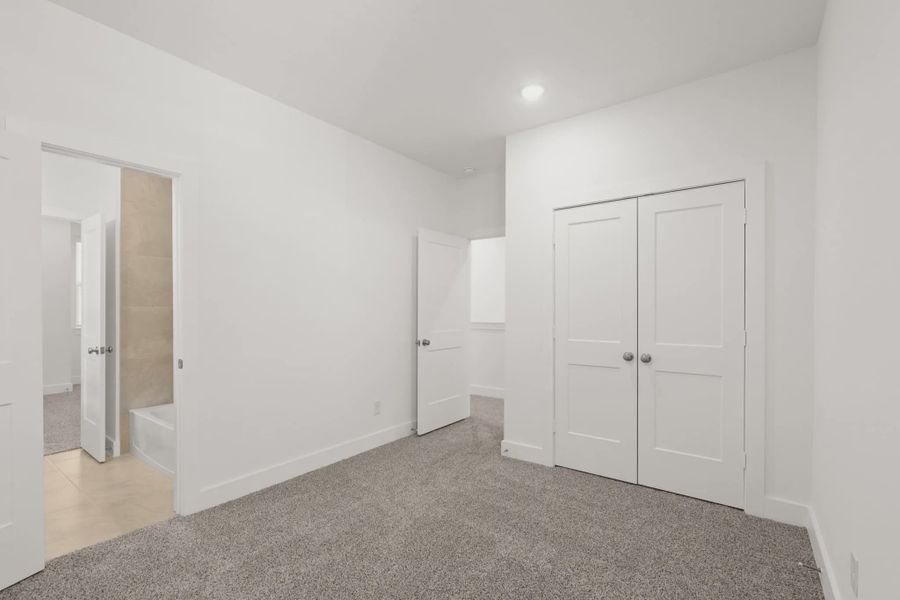 Representative unfurnished interior of a home built from the Cheverny by Chesmar Homes in Santa Rita Ranch, Liberty Hill (Image 13).