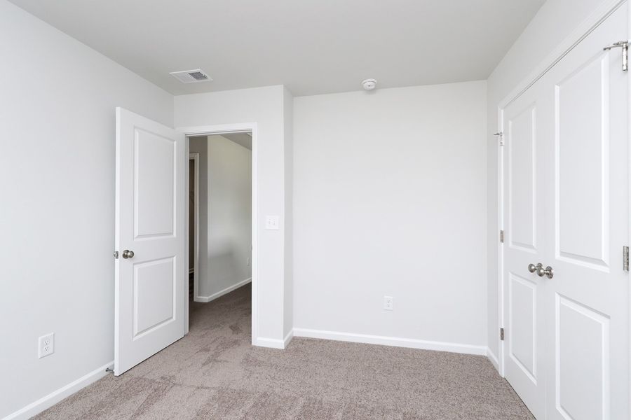 Spacious, unfurnished interior of a new home in Hainer Place, Conway (Image 23).