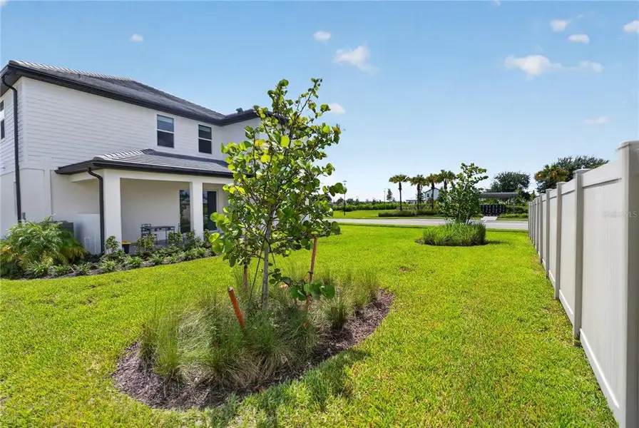 Exterior details and patio area of a home in , Sarasota (Image 4).