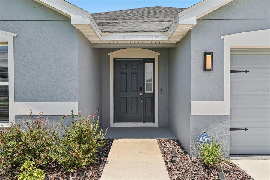 Exterior details and patio area of a home in The Crossings - Single-Family Homes, St. Cloud (Image 3).