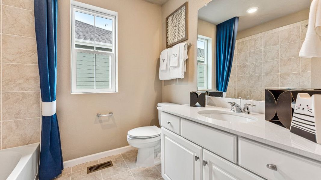 Furnished interior view inside a new home in The Aurora Highlands, Aurora (Image 25).