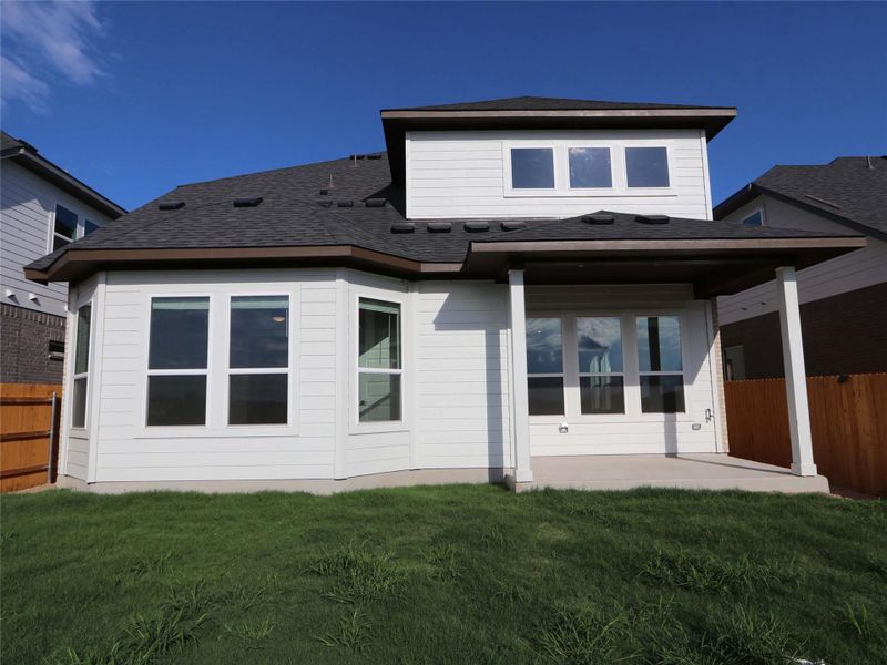 Exterior details and patio area of a home in Estancia West, Manchaca (Image 4).