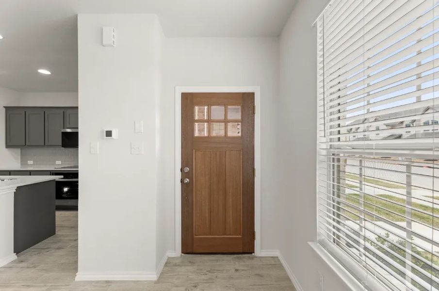 Front exterior of a new home in Sanger Circle, Sanger, TX, highlighting curb appeal (Image 17).