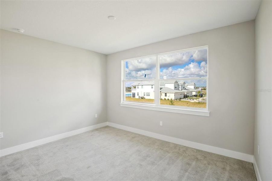 Spacious, unfurnished interior of a new home in Lagoon Residences at Epperson, Wesley Chapel (Image 23).