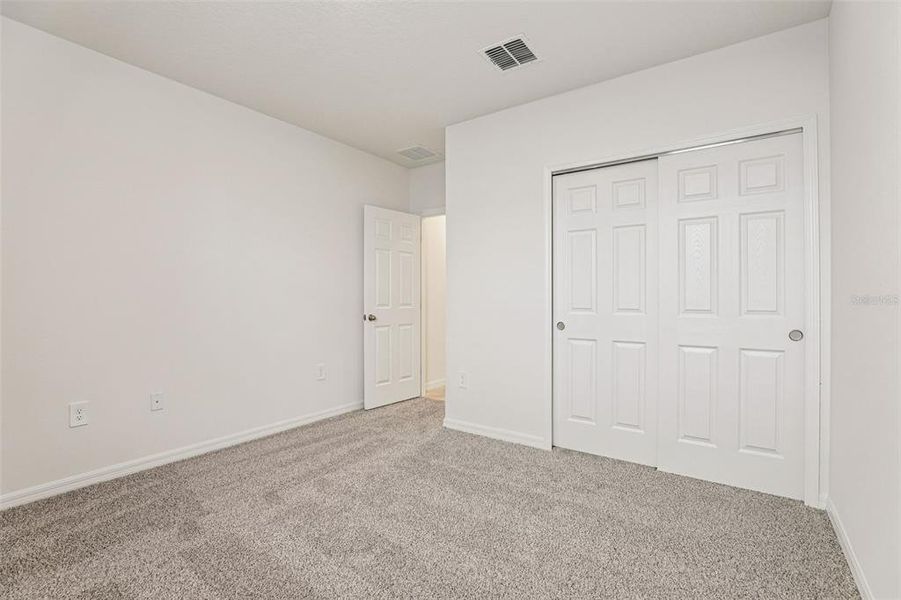 Spacious, unfurnished interior of a new home in Lawson Dunes - Signature Series, Haines City (Image 32). Spacious, unfurnished interior of a new home in Lawson Dunes - Signature Series, Haines City (Image 32).