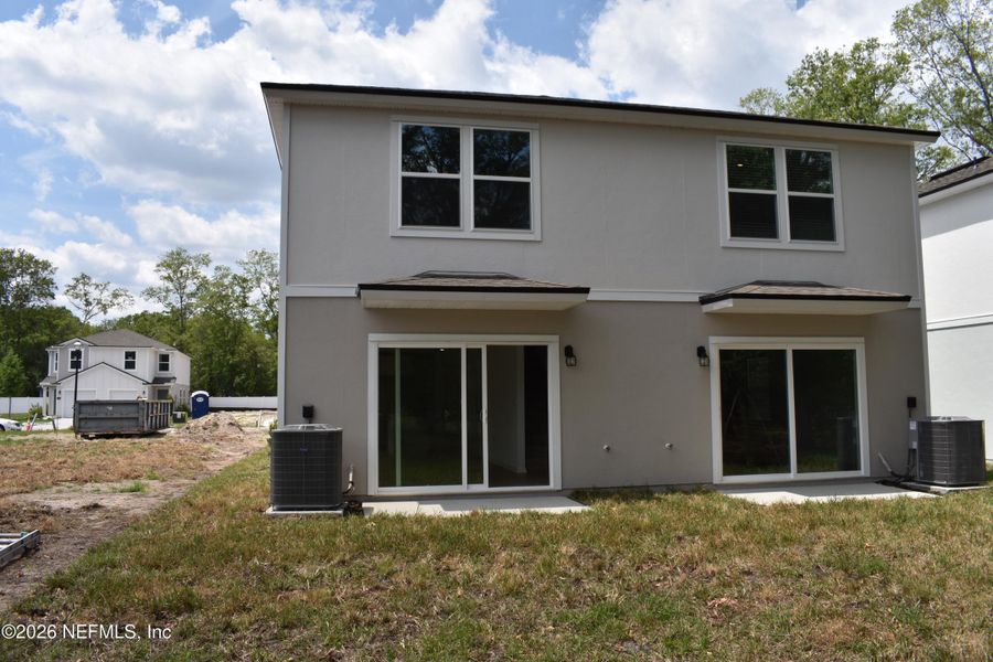 Exterior details and patio area of a home in Irongate Villas, Jacksonville (Image 3).