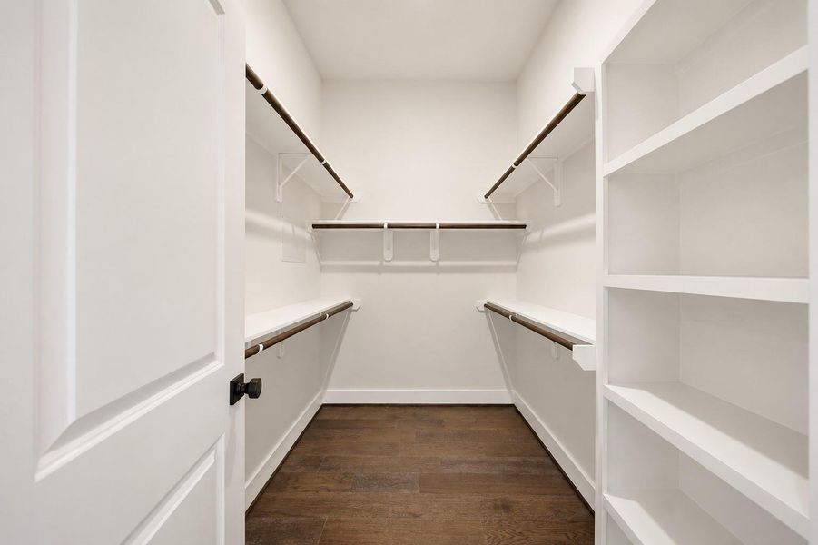 Large walk-in closet Large walk-in closet