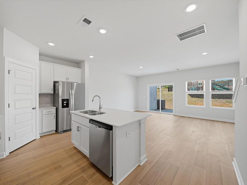 Furnished interior view inside a new home in Crossing at Abner Creek Townes, Greer (Image 4).