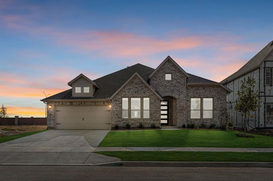 Front exterior of a new home in Wildflower Ranch 60-65, Fort Worth, TX, highlighting curb appeal (Image 17). Front exterior of a new home in Wildflower Ranch 60-65, Fort Worth, TX, highlighting curb appeal (Image 17).