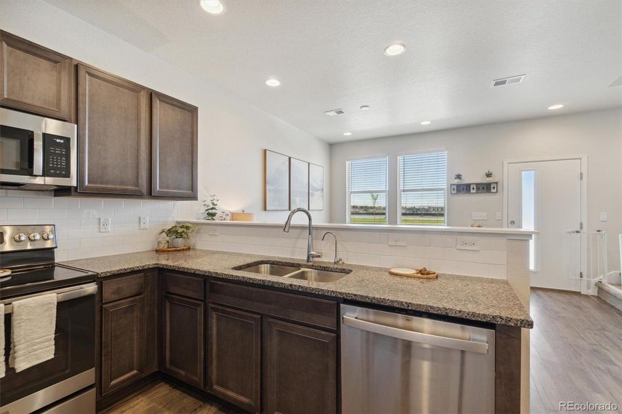 Looking from kitchen to living room - open concept and great for entertaining!