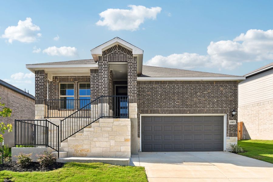Front exterior of the Briscoe floorplan at a Meritage Homes community. Front exterior of the Briscoe floorplan at a Meritage Homes community.