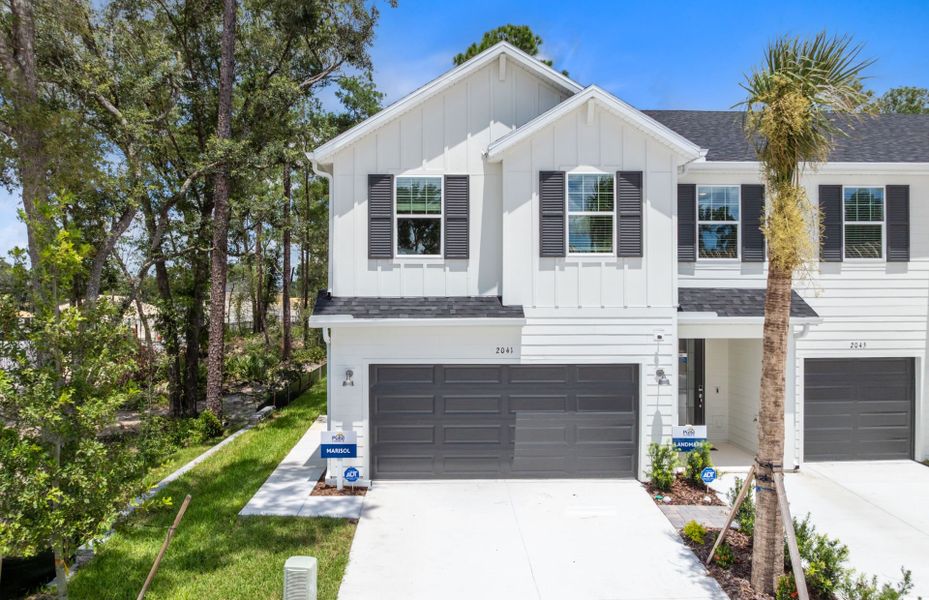 Representative exterior photo of a completed home built from the Marisol by Pulte Homes in Canopy Preserve, Deland, FL (Image 2). Representative exterior photo of a completed home built from the Marisol by Pulte Homes in Canopy Preserve, Deland, FL (Image 2).