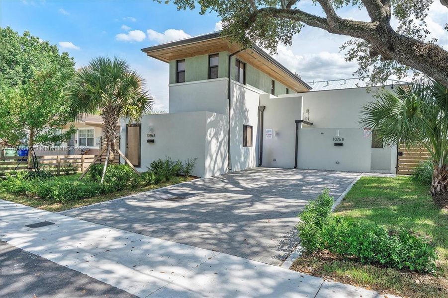 Front exterior of a new home in , Miami, FL, highlighting curb appeal (Image 1). Front exterior of a new home in , Miami, FL, highlighting curb appeal (Image 1).