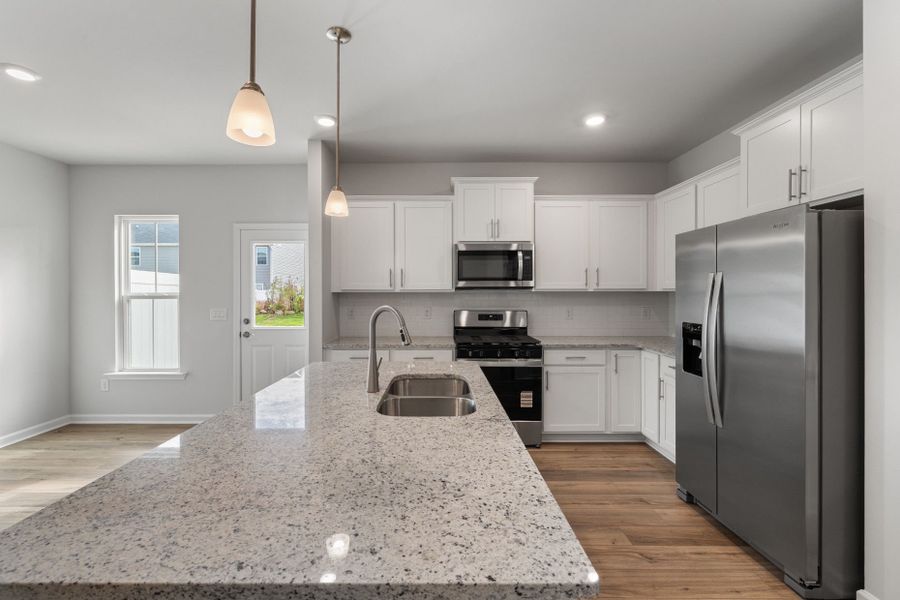 Furnished interior view inside a new home in Poets Walk, Whitsett (Image 6).