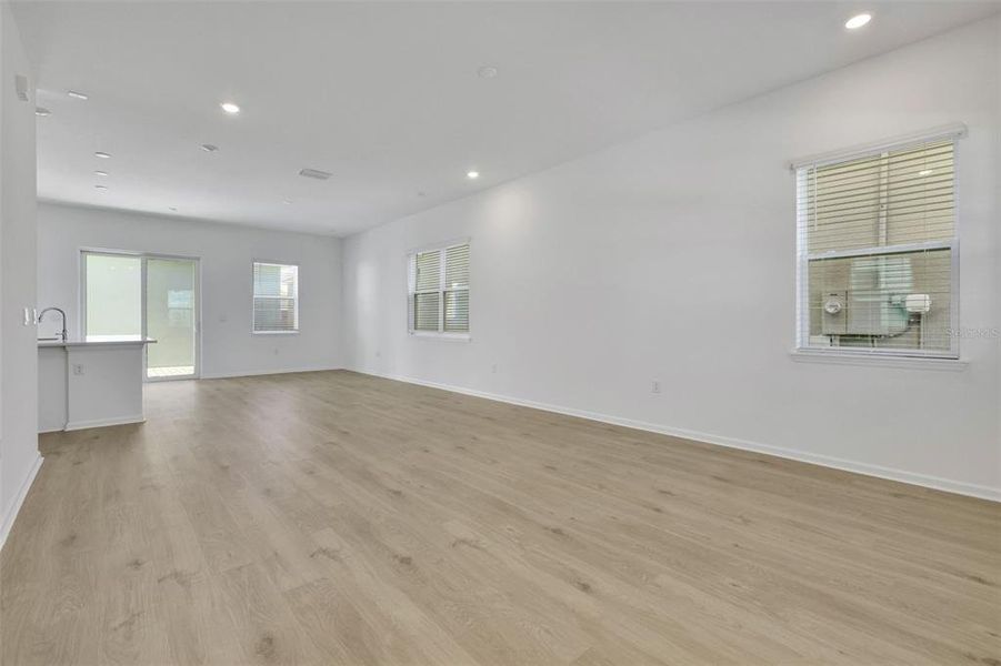 Spacious, unfurnished interior of a new home in Serenade at Ovation, Winter Garden (Image 27).