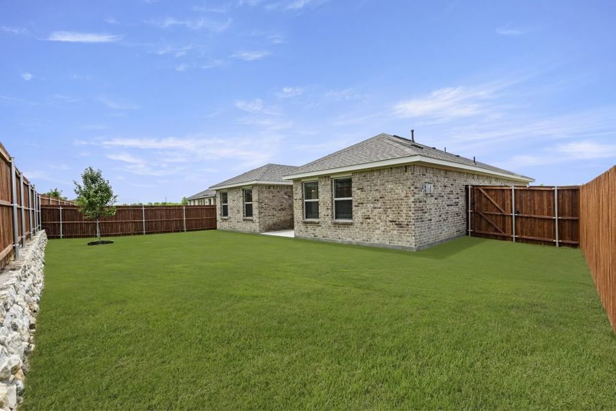 Representative exterior photo of a completed home built from the Boston by Impression Homes in Northspur, Terrell, TX (Image 26). Representative exterior photo of a completed home built from the Boston by Impression Homes in Northspur, Terrell, TX (Image 26).