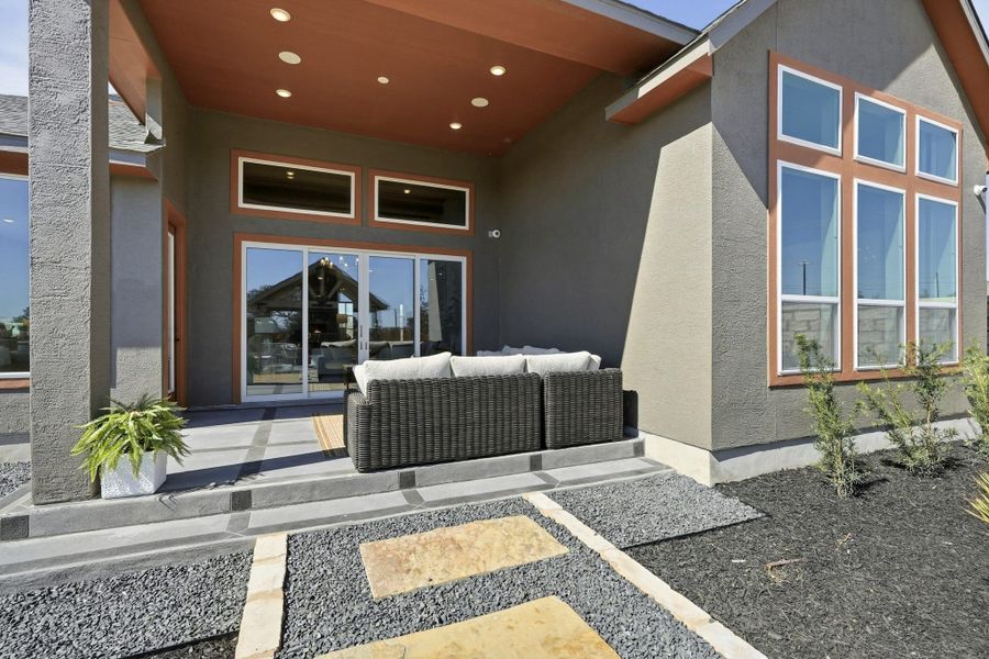Exterior details and patio area of a home in Prominence, San Antonio (Image 31).