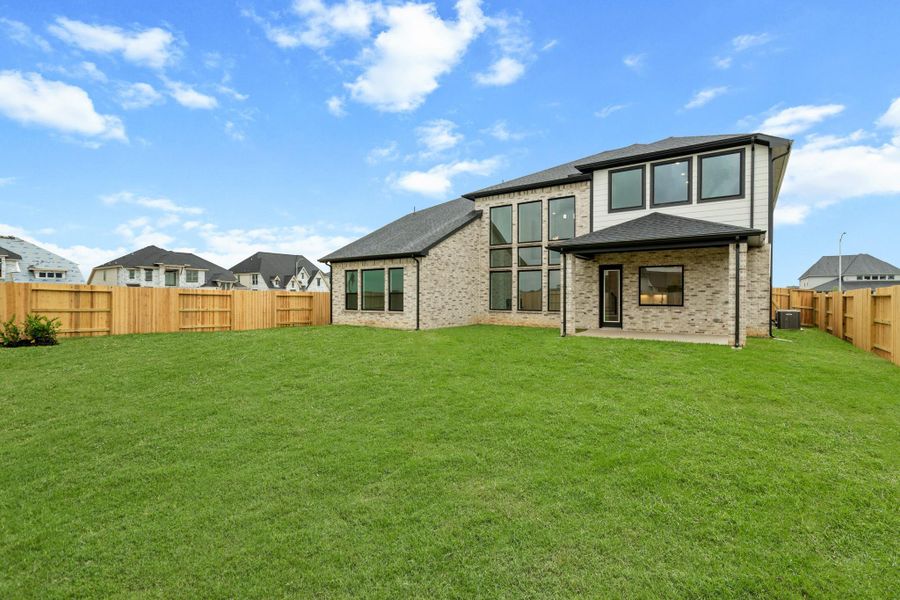 Exterior details and patio area of a home in Legacy Prairie at Katy Court 60', Katy (Image 3).