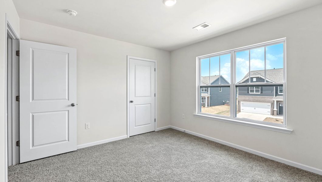 Spacious, unfurnished interior of a new home in Waverly Station, Greenwood (Image 23).