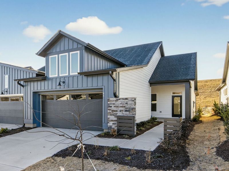 Front exterior of a new home in Encore at Chatham Park – Villa Series, Pittsboro, NC, highlighting curb appeal (Image 2). Front exterior of a new home in Encore at Chatham Park – Villa Series, Pittsboro, NC, highlighting curb appeal (Image 2).