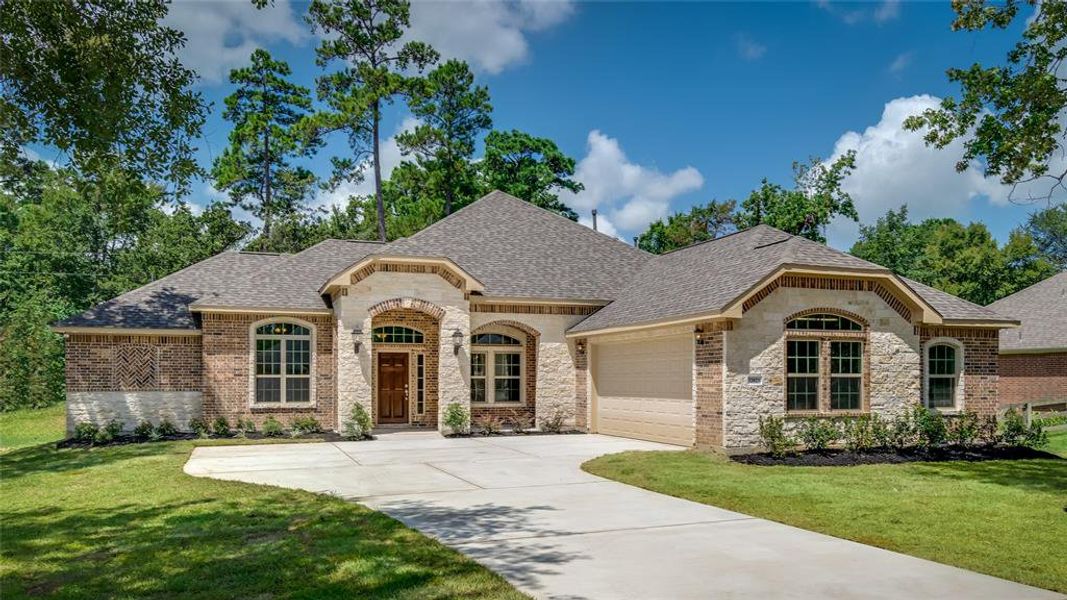 Home is under construction.  Photos are of a recently completed home by this builder.  New home will have similar finishes.