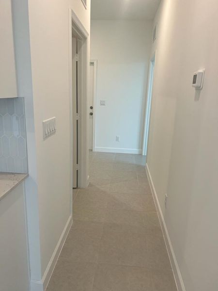 Spacious, unfurnished interior of a new home in Arden: The Twin Homes Collection, Loxahatchee (Image 7).