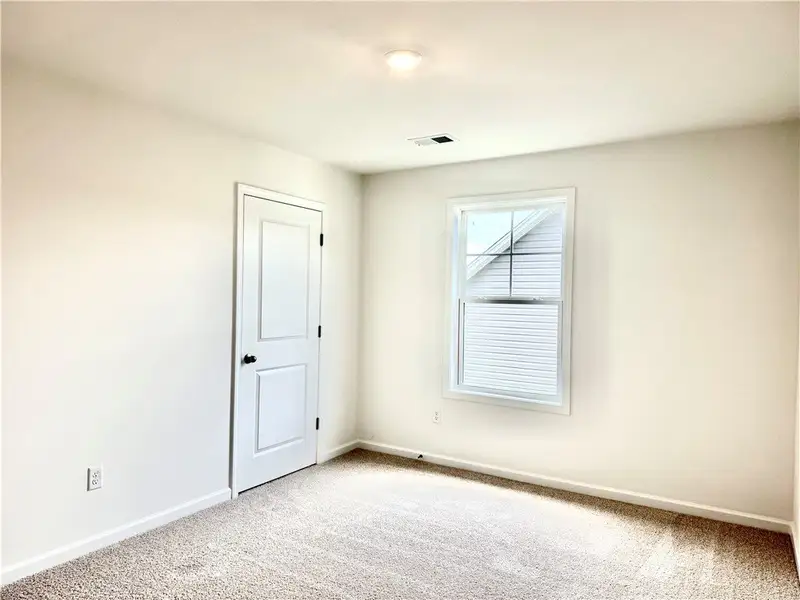 Plush carpeting and a classic multi-pane window cr