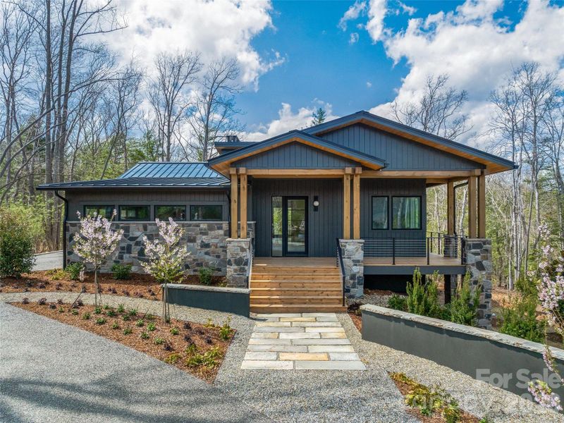 Front exterior of a new home in , Asheville, NC, highlighting curb appeal (Image 25).