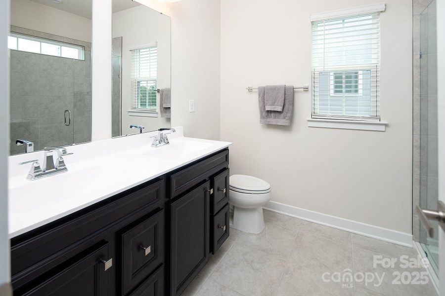 Furnished interior view inside a new home in , Huntersville (Image 11).