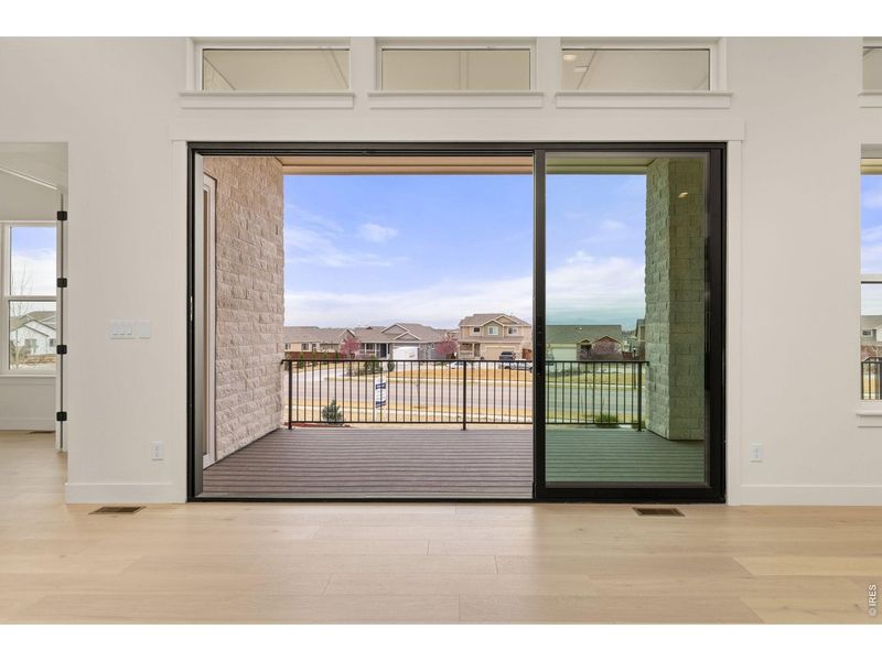 Exterior details and patio area of a home in RainDance, Windsor (Image 3).