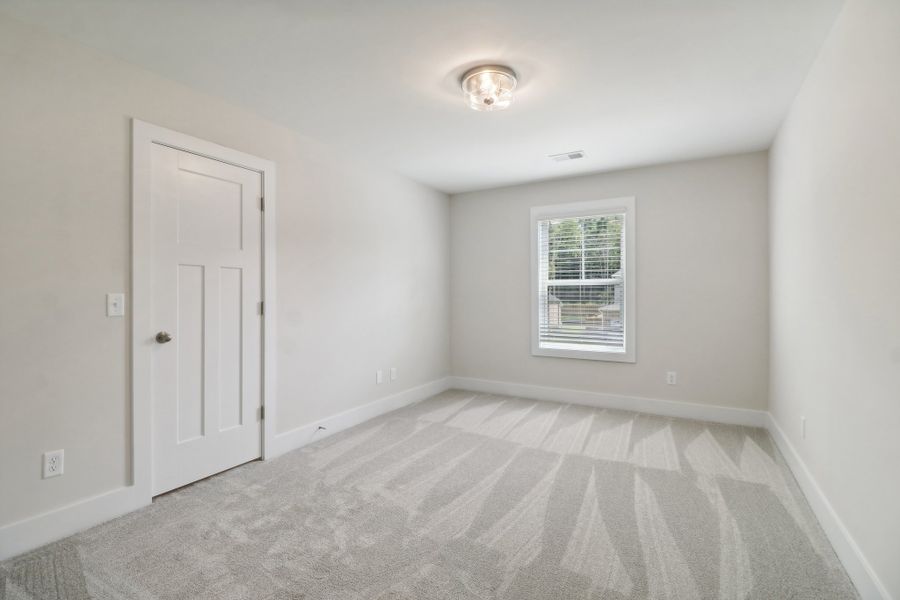 Representative unfurnished interior of a home built from the Sonoma II by Great Southern Homes in Edwards Ridge, Central (Image 40).