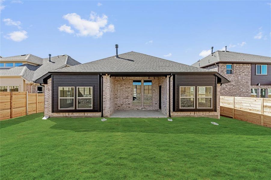 Front exterior of a new home in Painted Tree Woodland District 50, McKinney, TX, highlighting curb appeal (Image 24).