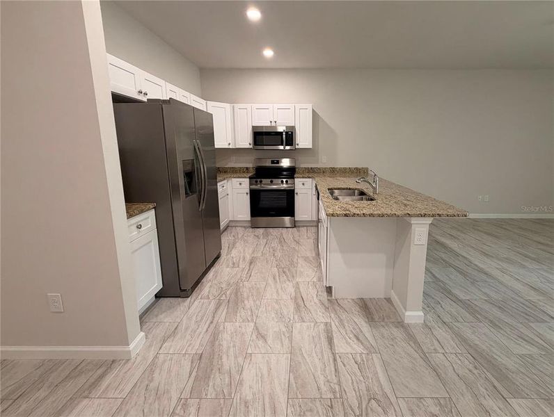 Furnished interior view inside a new home in , Port Charlotte (Image 12). Furnished interior view inside a new home in , Port Charlotte (Image 12).