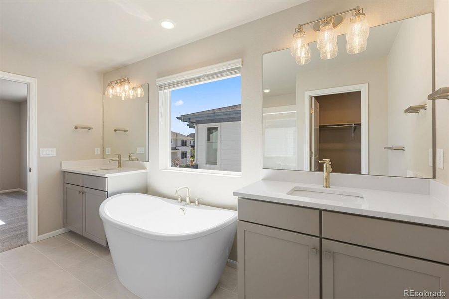 Furnished interior view inside a new home in Woodrose at Painted Prairie, Aurora (Image 10).