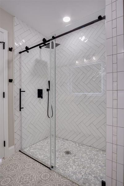 Full bath featuring a stall shower