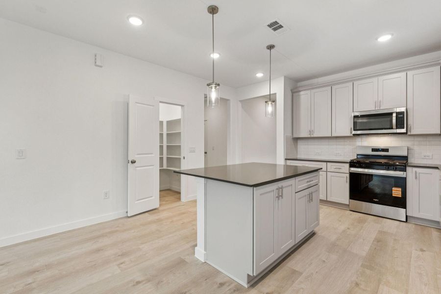 Furnished interior view inside a new home in Mavera, Conroe (Image 7).