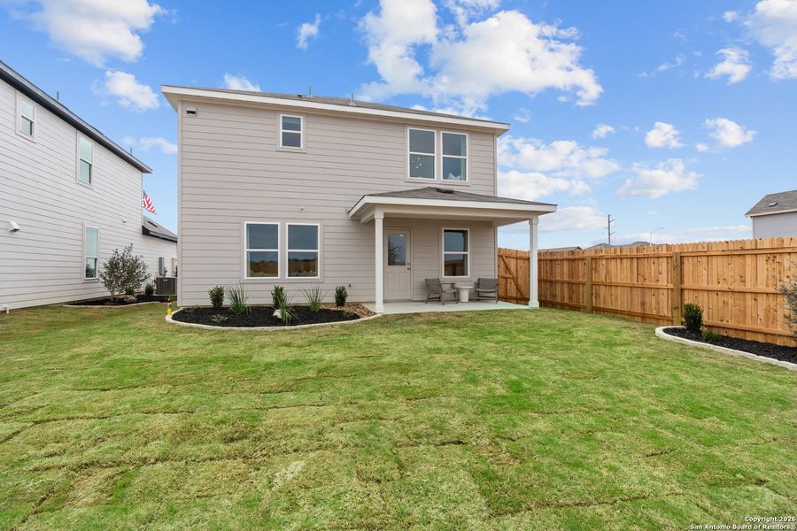 Exterior details and patio area of a home in Horizon Ridge, San Antonio (Image 2).