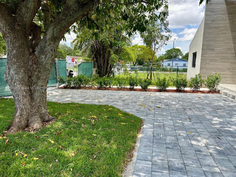 Front exterior of a new home in , Miami, FL, highlighting curb appeal (Image 40).
