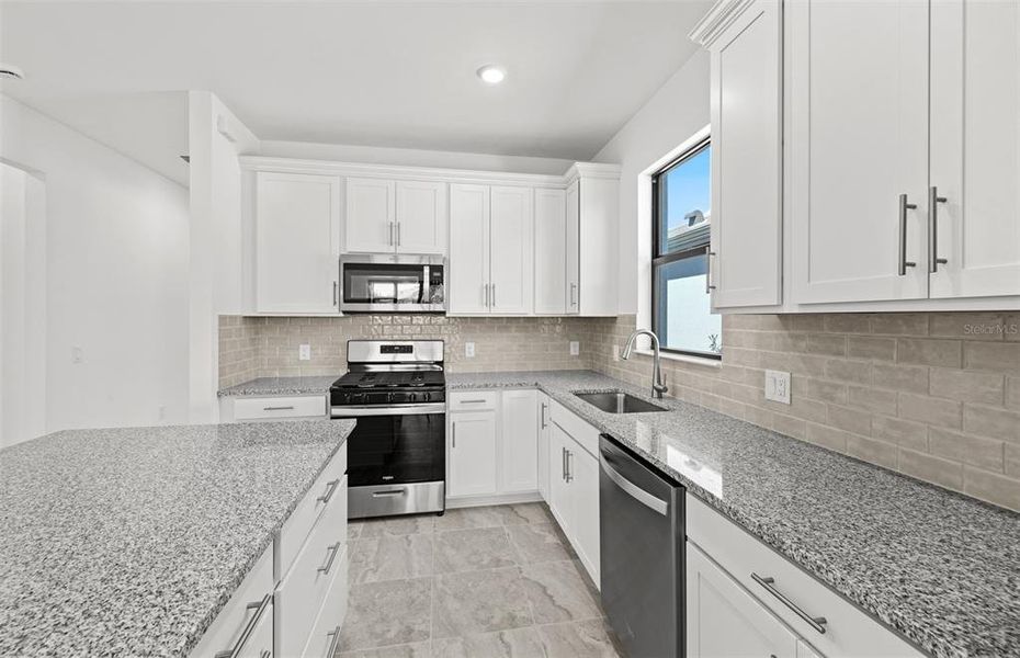 Furnished interior view inside a new home in Arbor Oaks, North Port (Image 5). Furnished interior view inside a new home in Arbor Oaks, North Port (Image 5).