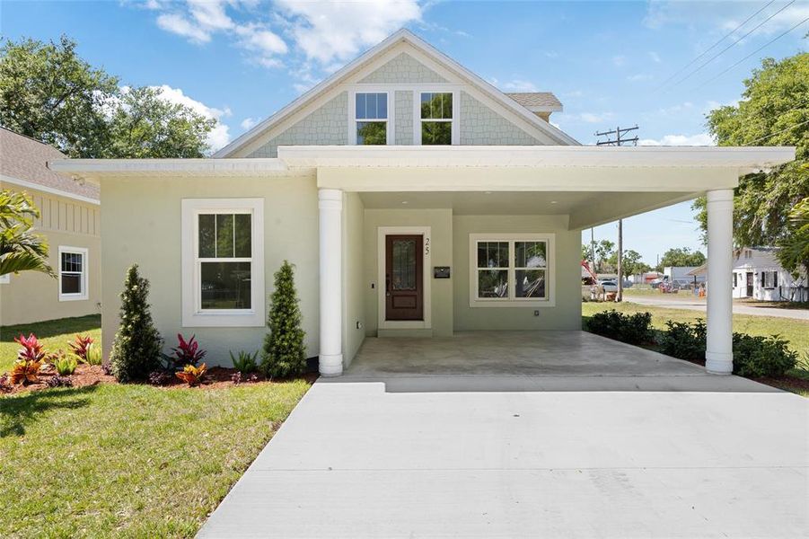 Front exterior of a new home in , Plant City, FL, highlighting curb appeal (Image 16).