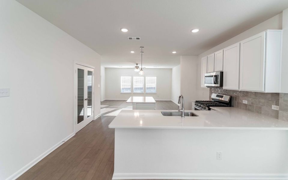 Furnished interior view inside a new home in Travis Ranch, Forney (Image 3).