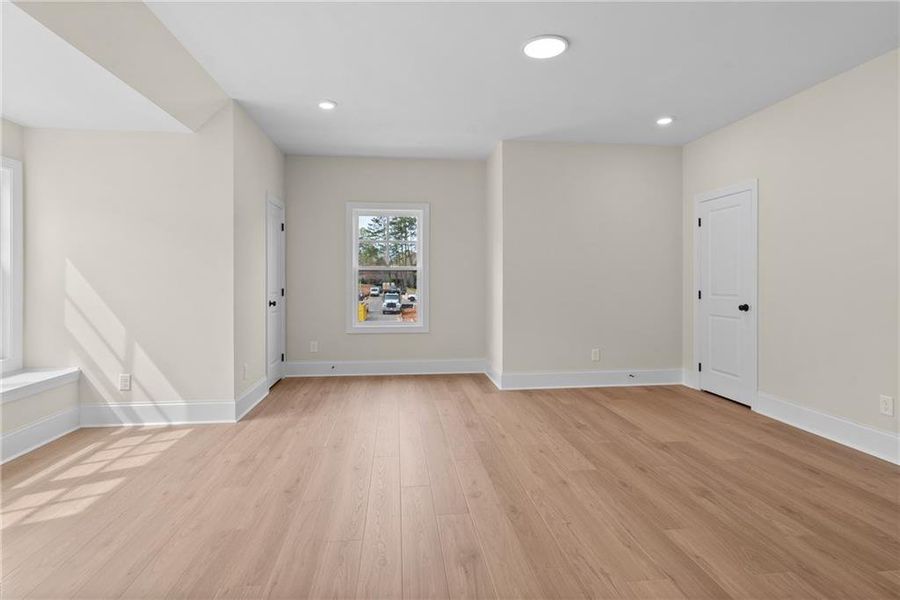 Spacious, unfurnished interior of a new home in Bellwyn, Johns Creek (Image 24).