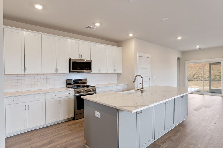 Furnished interior view inside a new home in Eagle Creek, Central (Image 6).