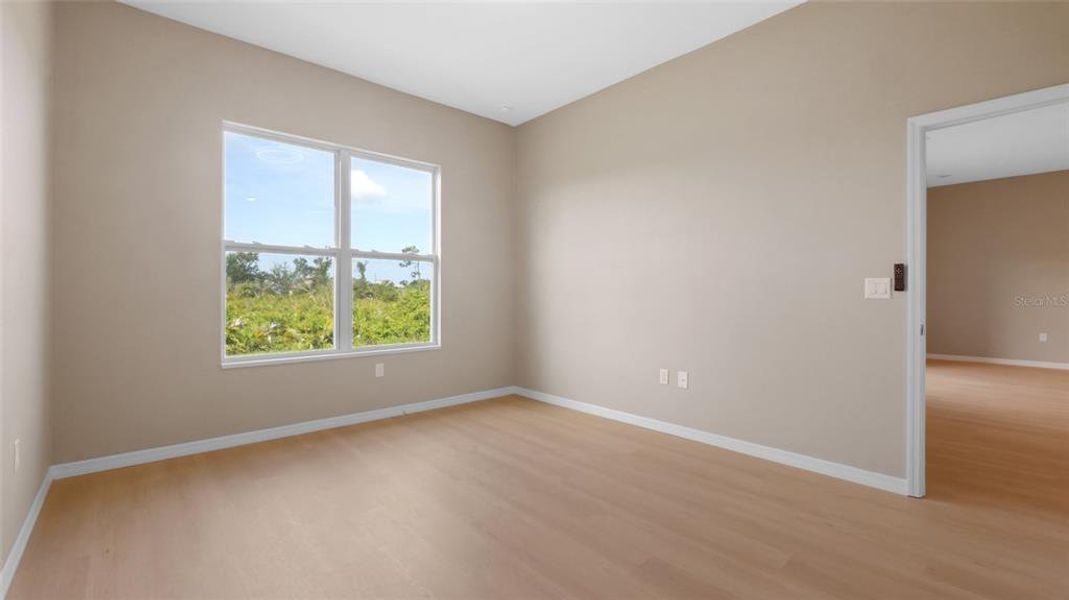 Spacious, unfurnished interior of a new home in , Port Charlotte (Image 25).