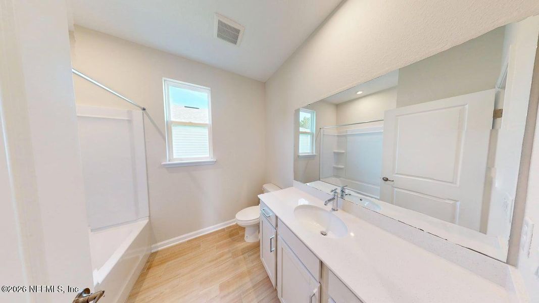 Furnished interior view inside a new home in Lakes at Bella Lago, Green Cove Springs (Image 4).